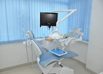 Dr Kaustubh Patil / Dr Milind Desai ( The Dental Solutions )